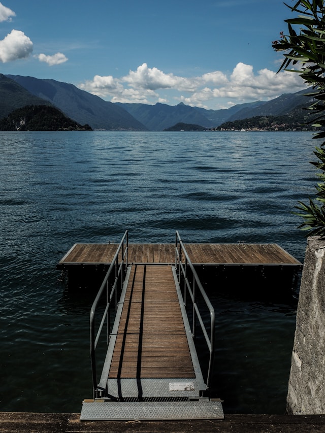 Image of a dock that leads to lake.